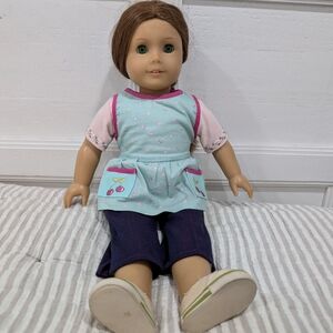American Girl Doll with Pink Collar and Blue Outfit